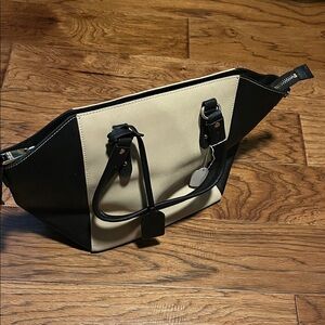 Badgley Mischka 
Stylish Black and Cream Handbag